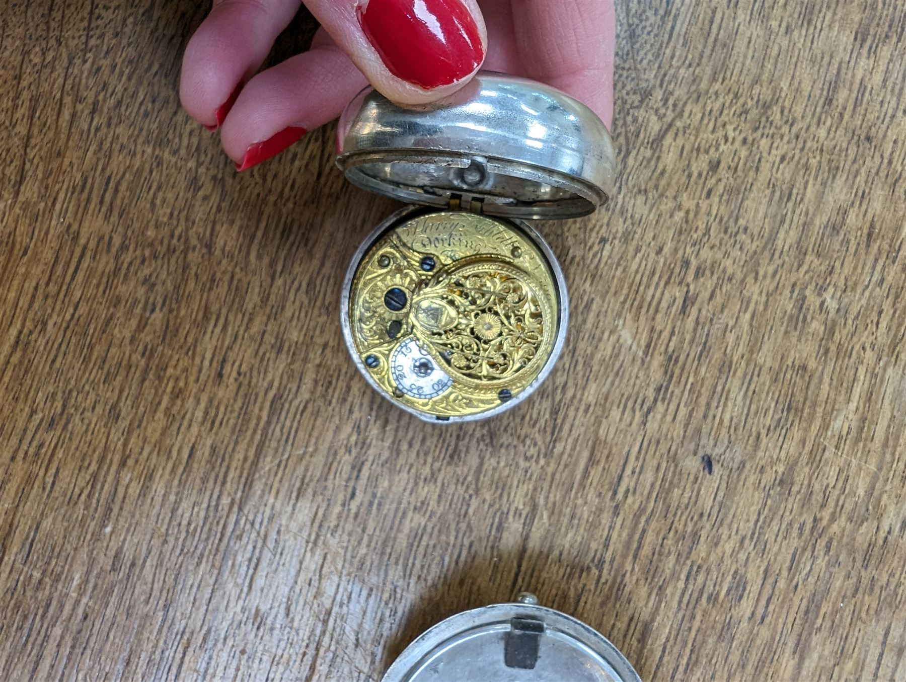 George III silver pair cased verge fusee pocket watch by Harry Niblett, Dorking, No. 5991, white enamel dial with Arabic numerals and outer minute ring, case makers mark TG, London 1787 