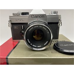 Canon FTb camera body, serial no. 715838, with 'Canon FD 50mm 1:1.8' lens, serial no. 207888, in original box, together with Canon FTb camera body, serial no. 557817, with 'Canon FD 35mm 1:3.5 S.C' lens, serial no. 126210 and Canon EX Auto camera body, serial no. 296244 with 'Canon EX 50mm 1:1.8' lens, serial no. 380869  