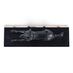 French Art Deco spelter figure of a recumbent dog on marble and onyx plinth, H14cm, L30cm