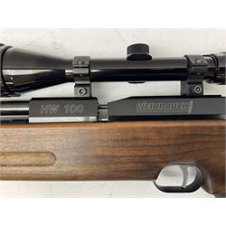 Weihrauch HW100 .22 calibre PCP repeating air rifle; walnut thumbhole stock with textured pistol-grip; Nikko Stirling Silver Crown 3-9x40 telescopic sight; integral sound moderator; No.1901181 L99cm overall; in gun sling; with Logun Combi-Pump and quantity of pellets