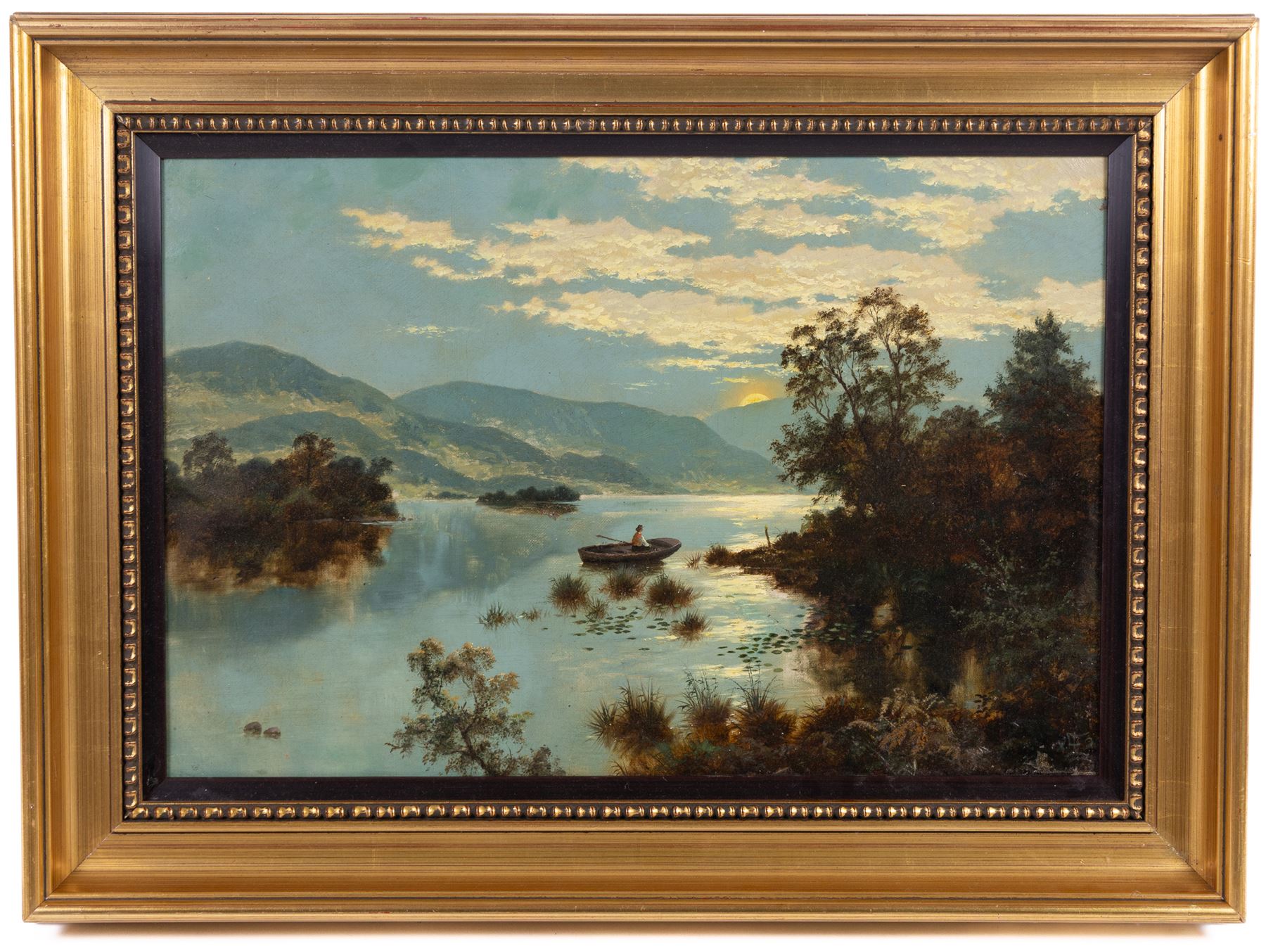 Edgar Longstaffe (British 1852-1993): Boating at Sunset, oil on canvas signed with monogram and dated 1891, 34cm x 52cm 