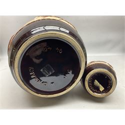 Pair of Bay West German vases, with bold moulded flower and foliage decoration in green, orange and ochre on brown ground, largest H40cm