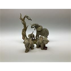 Three Franklin Mint figures, first example On The Prowl, on wooden stand H32cm, L63.5cm, Grizzly, H23cm and American Majesty by Ronald Van Ruyckevelt H37cm, together with five other figures.  