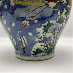 19th century Chinese Wucai vase and cover, decorated  with peacock on blue rockwork and other birds flying amongst tree peonies, H43cm