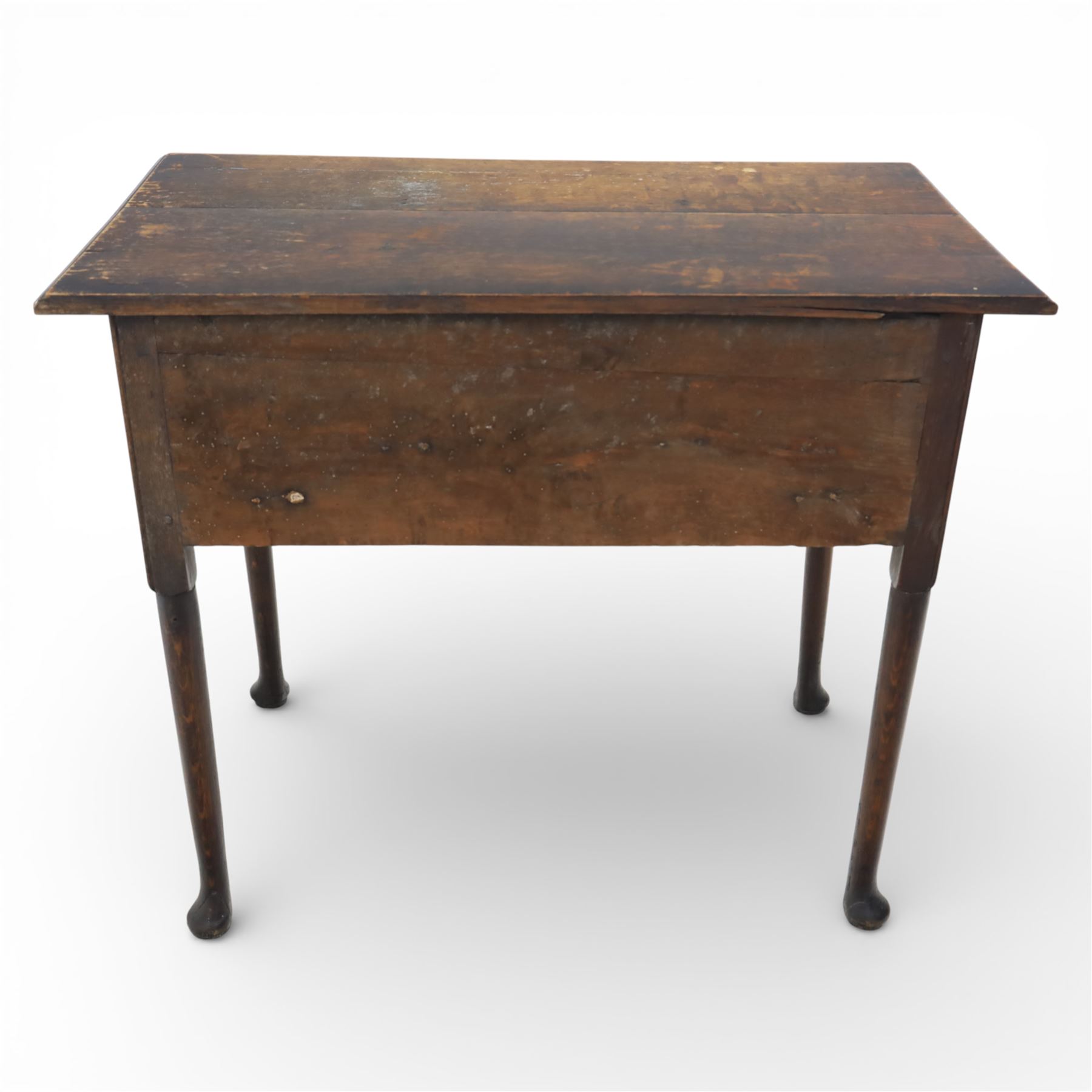 Georgian oak lowboy, the rectangular top with moulded edge over three fitted drawers and shaped apron, raised upon slender cabriole legs, with pad feet