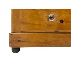 Victorian waxed pine chest, fitted with two short over two long drawers, each with glass handles