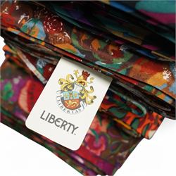 Six rolls or bolts of Liberty fabrics, in various patterns, largest roll approx. W75cm (6)