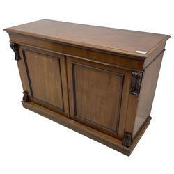 Early 19th century mahogany chiffonier sideboard, fitted with two frieze drawers over two panelled cupboards, flanked by foliate brackets, on skirted base