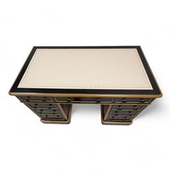 J. Maple & Co. (London: 1841-1988) - Victorian black painted and parcel gilt twin pedestal desk, moulded rectangular top with rounded corners and cream leather writing surface, fitted with nine drawers, on moulded plinth base, stamped 'J. Maple & Son' 