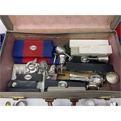 Three piece silver plated condiment set comprising; lidded mustard, salt, and pepper pot, with blue glass cases, together with large collection of silver plated Community  flatware etc, in two boxes 