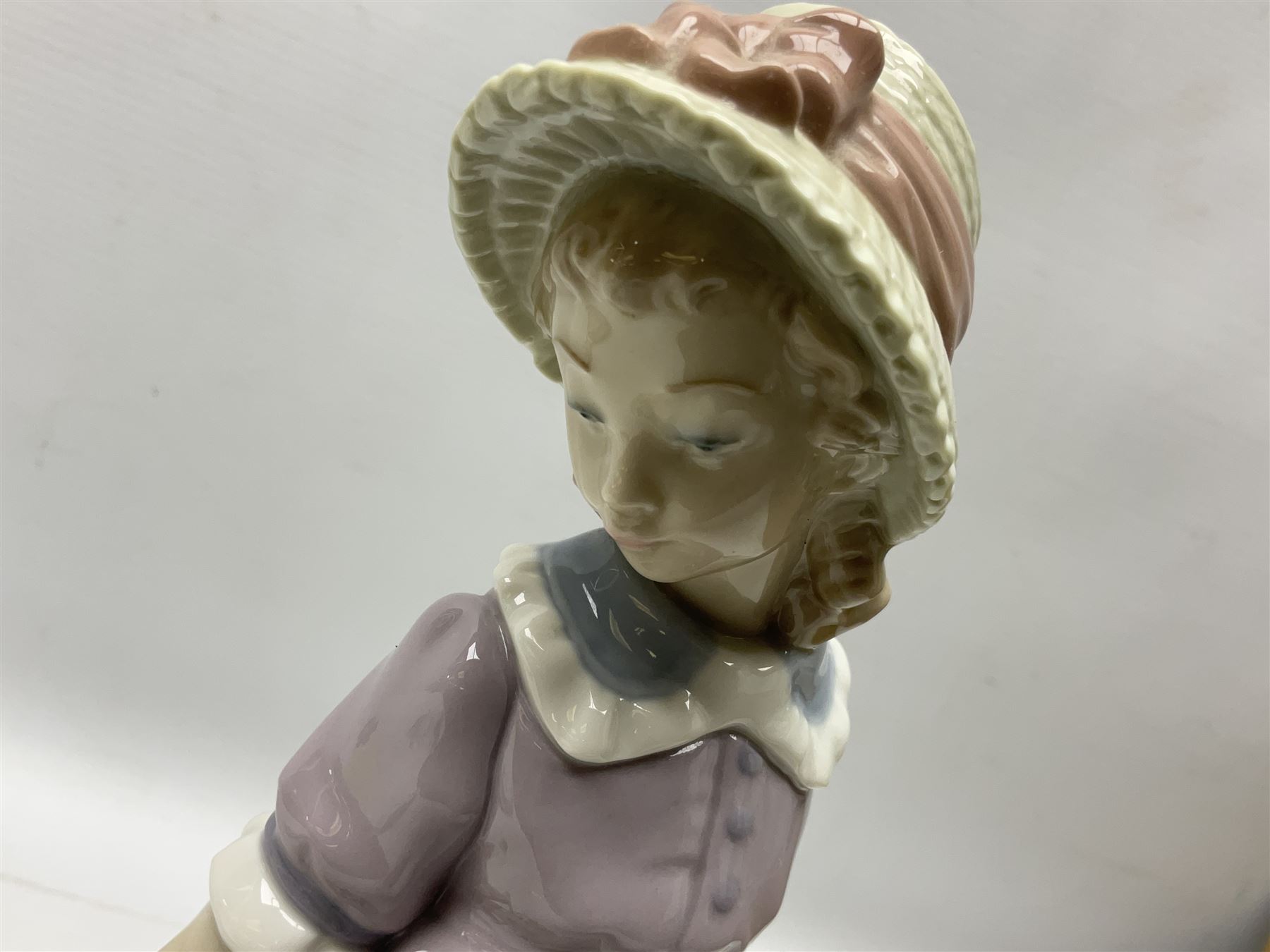 Four Lladro figures, comprising Pulling Dolls Carriage no 5044, Belinda with her Doll no 5045, Pretty Pickings no 5222 and Shepherdess with basket no 4678 