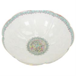 Chinese famille jaune eggshell porcelain bowl, decorated with dragons and foliage, upon hardwood stand, D26cm