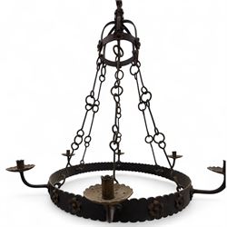 Mid-20th-century wrought iron Gothic revival chandelier, dome-shaped mount, above frame wi...