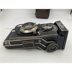 Welta Superfekta Folding twin lens camera, with 'Meyer Gorlitz Trioplan 1;3.8 f=10cm' lens serial no 649219 and 'Meyer Gorlitz Trioplan 1;3.8 f=7.5cm' lens serial no 653168, in fitted case