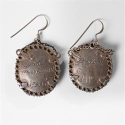 Northern Indian/Company School (19th Century): Emir Dost Mohammad Khan and his son Sher Ali Khan, pair of portrait miniature earrings on ivory, mounted in silver with filigree borders, likely commissioned during the period of British diplomatic engagement in Afghanistan (c.1860-1880), inscribed verso, each miniature approx. H2cm This item has been registered for sale under Section 10 of the APHA Ivory Act
