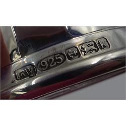 Pair of modern silver salt and pepper shakers, of tapering faceted form, hallmarked Laurence R Watson & Co, Birmingham 2009, H7cm, boxed 