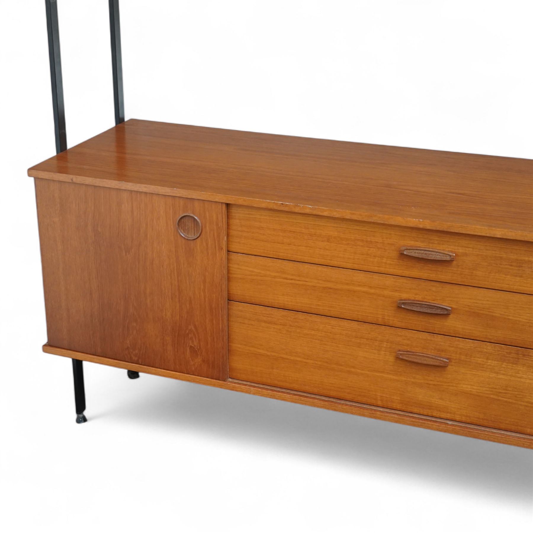 Avalon - modular teak wall unit, with black metal supports, fitted with cupboards, drawers, and adjustable shelves, corner configuration