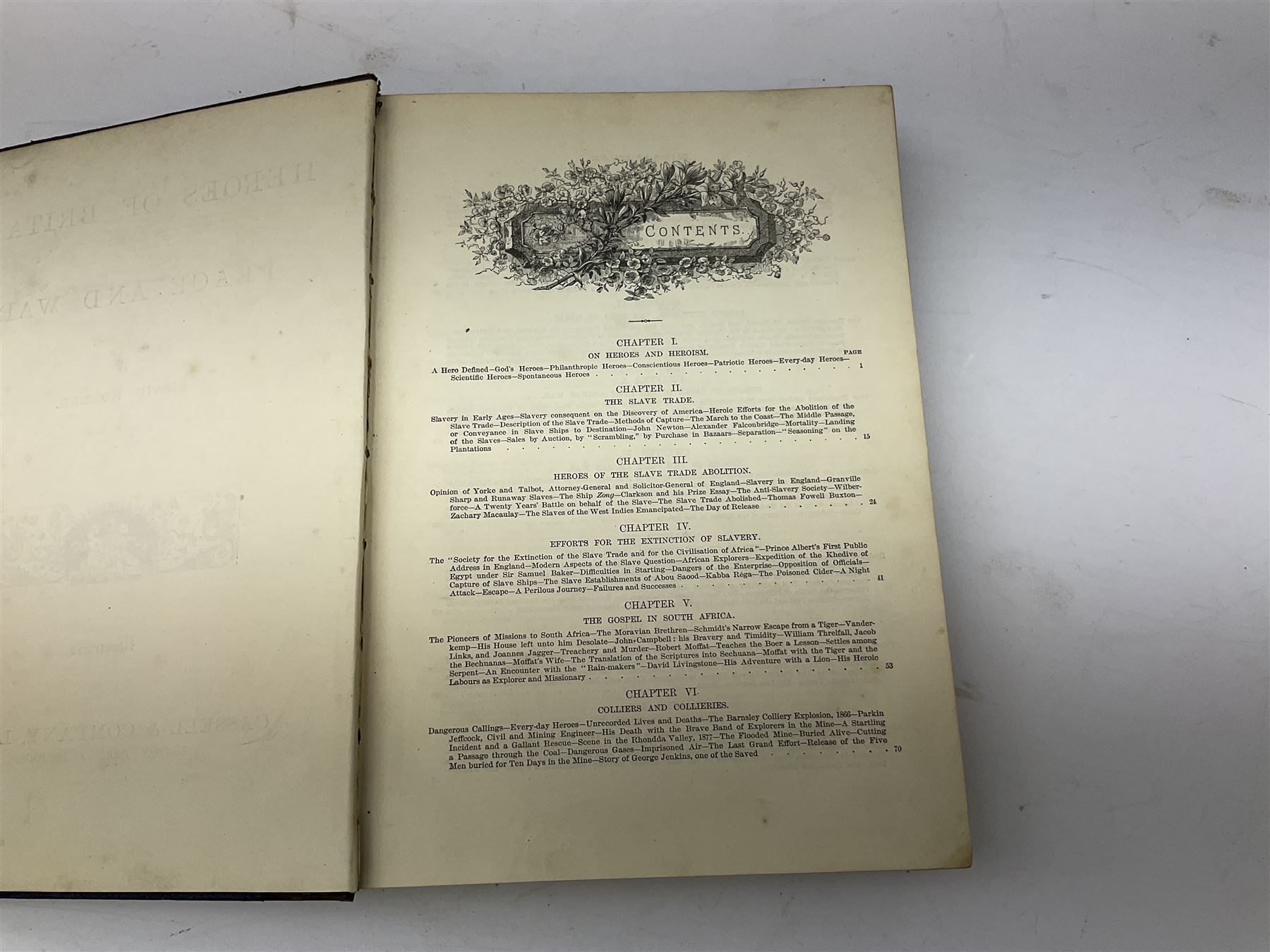 Payne (Harry) Artist: Victoria Cross Gallery; Complete set of twelve chromolithographic relief printed cards published by Birn Bros. (BB). Each: 120 x 155 mm; displayed together in an ebonised frame 54 x 82.5cm; together with the half leather bound reference book by Edwin Hodder entitled Heroes of Britain in Peace and War (2)