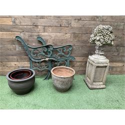 Cast stone garden fruit centrepiece on square base, pair of cast iron bench ends, and three planters - THIS LOT IS TO BE COLLECTED BY APPOINTMENT FROM DUGGLEBY STORAGE, GREAT HILL, EASTFIELD, SCARBOROUGH, YO11 3TX