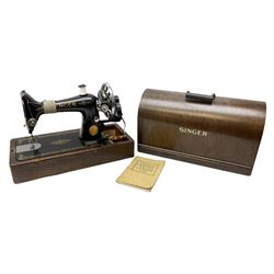 Singer sewing machine no. EA584046 in case (missing key) and Singer Manual of Family Sewing Machines