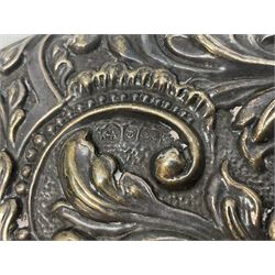 Silver mounted dressing table mirror, embossed with birds, masks, and foliate and C scrolls, hallmarked Birmingham, and fruit knife with mother of pearl handle and silver blade, (2)