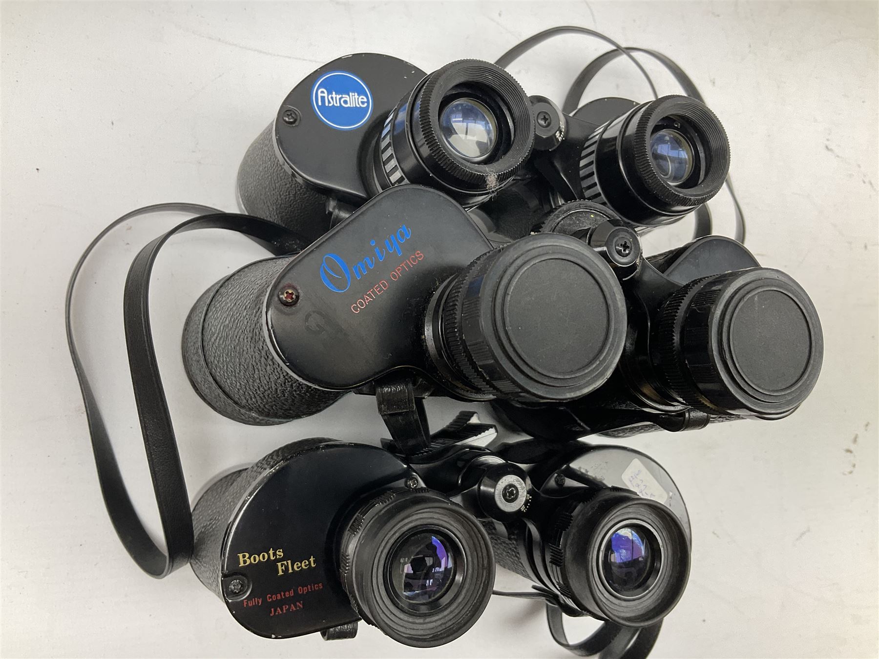 Eleven cased pairs of binoculars, to include Omiya 8x30, Tasco, Esde-Optik 8x40 Weitwinkel, Chinon 10x50 Field. Aico Rapide 8x30, Astralite zoom 6x- 14x32, etc
