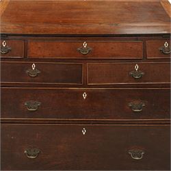 George III oak bureau, the fall front enclosing a fitted interior of small drawers and pigeonholes, above seven graduated drawers with brass plate handles and bone escutcheons, raised on bracket feet