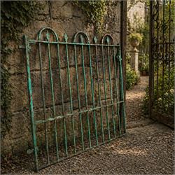 19th century French cast iron garden gate, finished in green rustic paint, bar form with h...