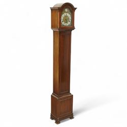 Carmichaels of Hull - mahogany cased 8-day musical grandmother clock c 1930 - with an arched pediment and arched hood, full-length trunk door on a short plinth raised on bracket feet, brass dial signed Tempus Fugit and Carmichaels of Hull with cast spandrels, matted dial centre and silvered chapter with Roman numerals, three train spring-driven movement chiming the quarters and hours on 8 gong rods with Westminster or Whittington chimes, movement stamped Elliott London with pendulum.