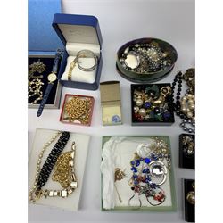 A collection of vintage and later costume jewellery, to include Butler & Wilson style brooches. 
