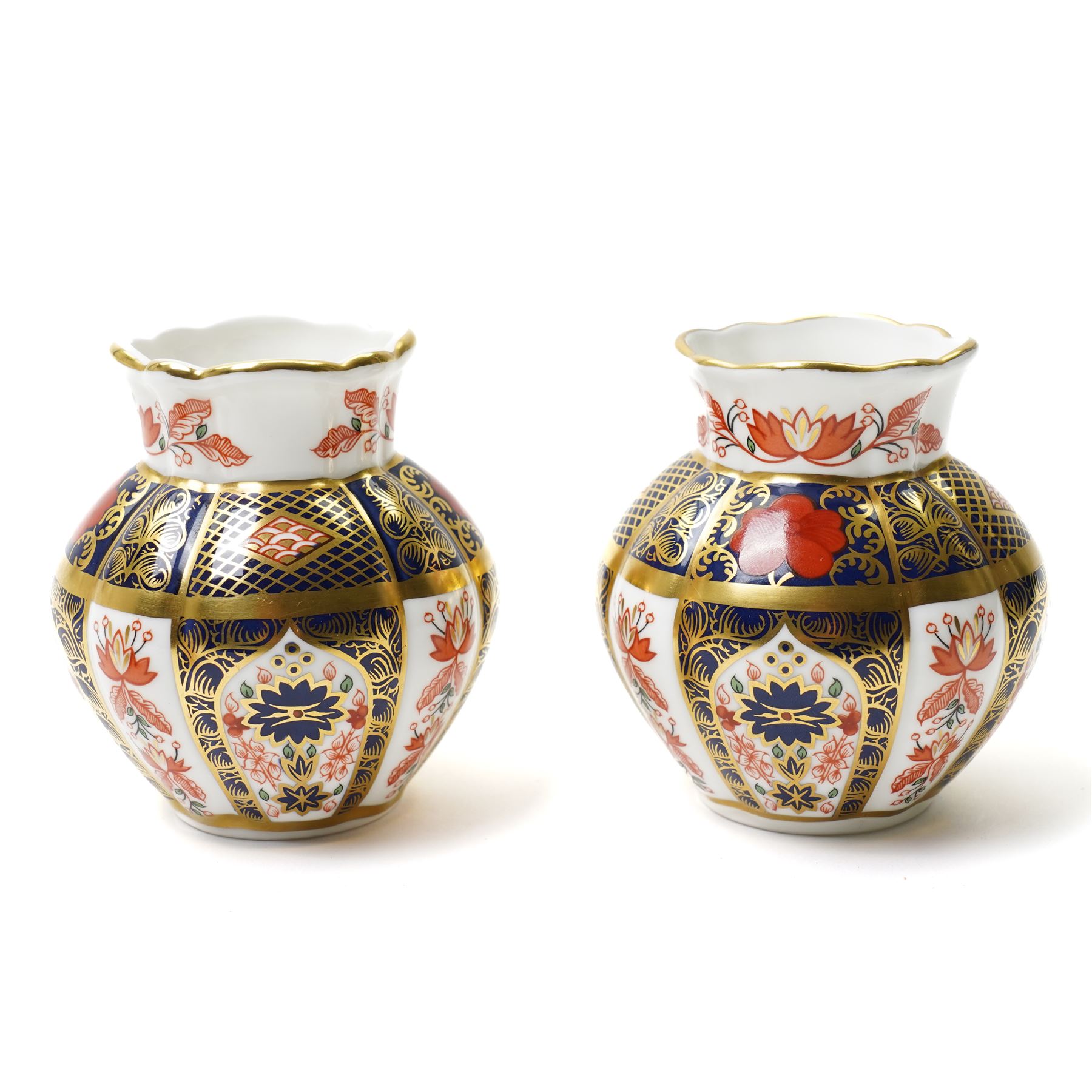 Pair of Royal Crown Derby Old Imari Viola vases, pattern 1128, boxed, H8cm; together with a pair of miniature toy drums, boxed (4)