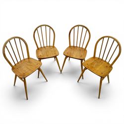 Ercol - set of four elm 'Windsor' chairs, hoop design back dish seat, tapering supports un...