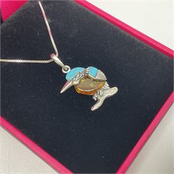 Silver Baltic Amber and Turquoise Kingfisher Pendant Necklace. Stamped 925.

This sweet little silver Kingfisher is made with Baltic Amber, also known as 'nature's time capsule' because of its prehistoric origins and ability to preserve organisms from millions of years ago. Paired with turquoise gemstones and some lovely detailing on the silver, this item makes for a very pretty piece of jewellery.  