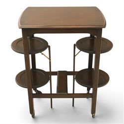 Early 20th century side table with double cake stand, rectangular moulded top, cake stands either side with support, raised on square legs terminating in castors