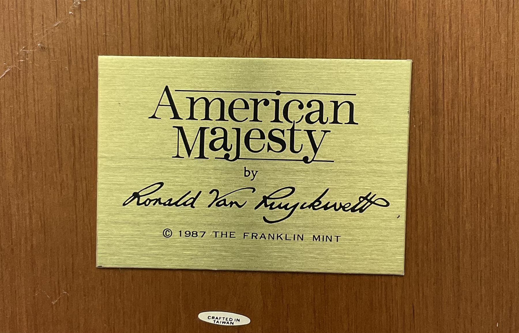 Three Franklin Mint figures, first example On The Prowl, on wooden stand H32cm, L63.5cm, Grizzly, H23cm and American Majesty by Ronald Van Ruyckevelt H37cm, together with five other figures.  