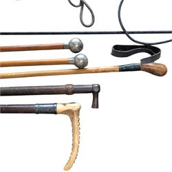20th Century hunting whip with horn handle, together with another hunting whip, two swagger sticks for Oakham School and Dean Close School, and a walking stick