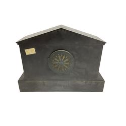 French - late 19th century 8-day mantle clock in a Belgium architectural slate case,  on a deep plinth with columns of recessed pillars flanking the dial, two part dial with a gilt centre and ivorine chapter with Roman numerals and fleur di Lis steel hands, twin train rack striking movement sounding the hours and half hours on a coiled gong. With pendulum.