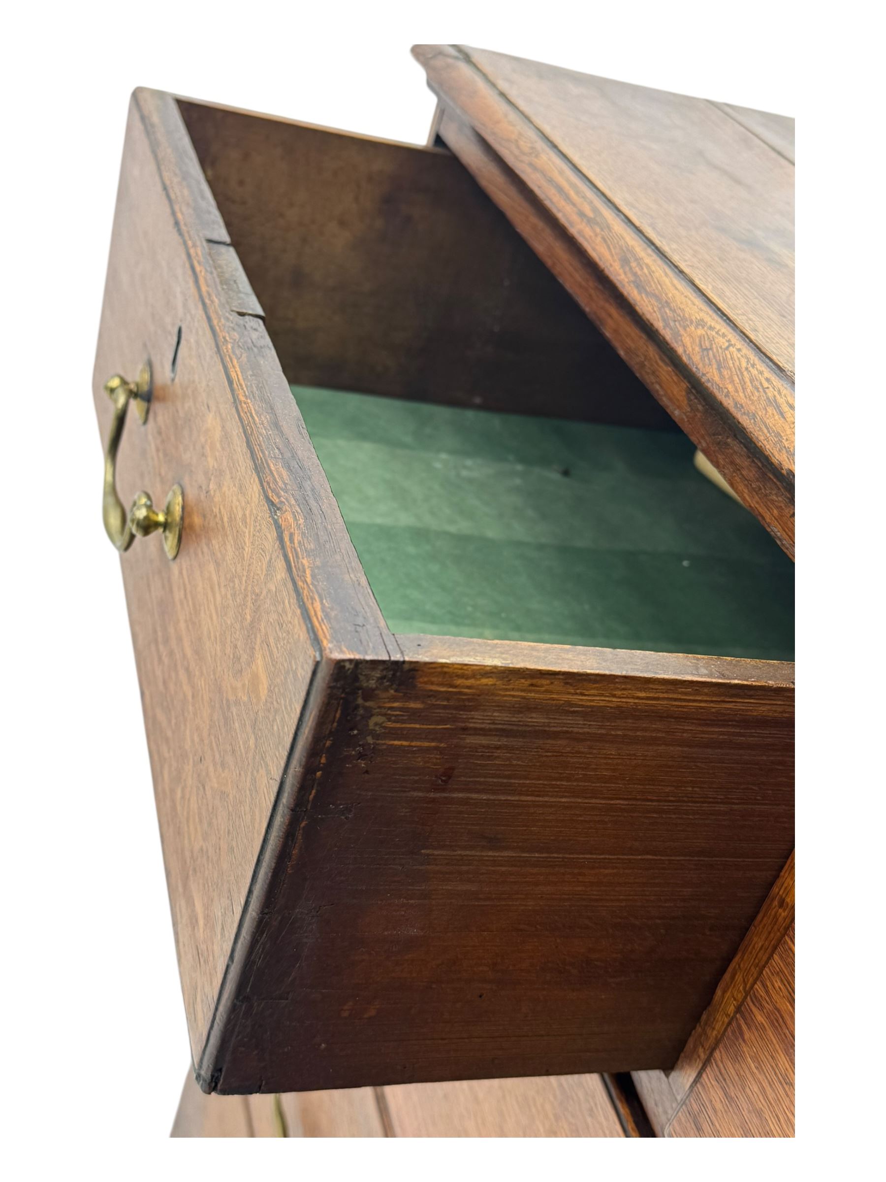 19th century oak chest, rectangular top over two short and three long drawers, on bracket feet
