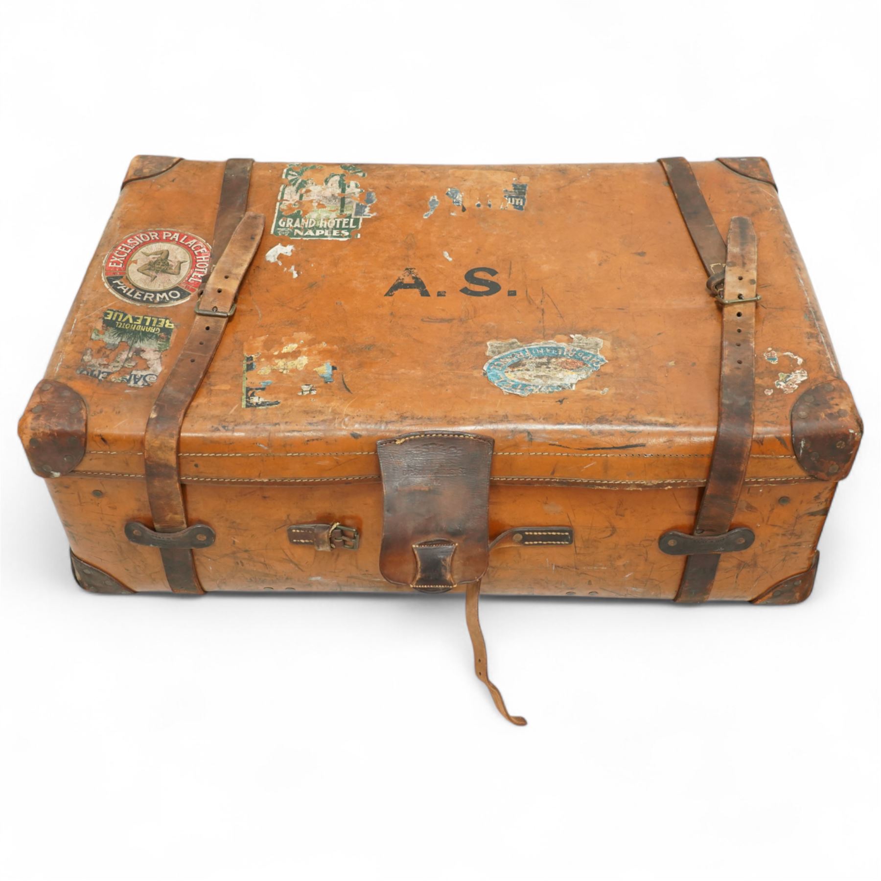 Two late 19th/early 20th century leather travelling 'Ideal' trunks, each stamped and engraved to brass locks F. Best & Co, various travel labels to include the Grand Hotel Naples, Grand Hotel Bellevue, Excelsior Palace Palermo, Waterloo etc, larger suitcase W93cm H32cm D58cm