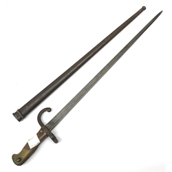 French Model 1874 Epee bayonet the 52cm steel blade inscribed 'Mre. d'Armes de St. Etienne Janvier 1880', in steel scabbard L66cm overall