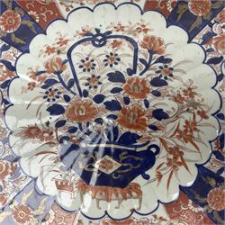 Large 19th century Japanese Imari pattern charger, with scalloped rim,  decorated centrally with a jardiniere of flowers surrounded with floral panels, D62cm 