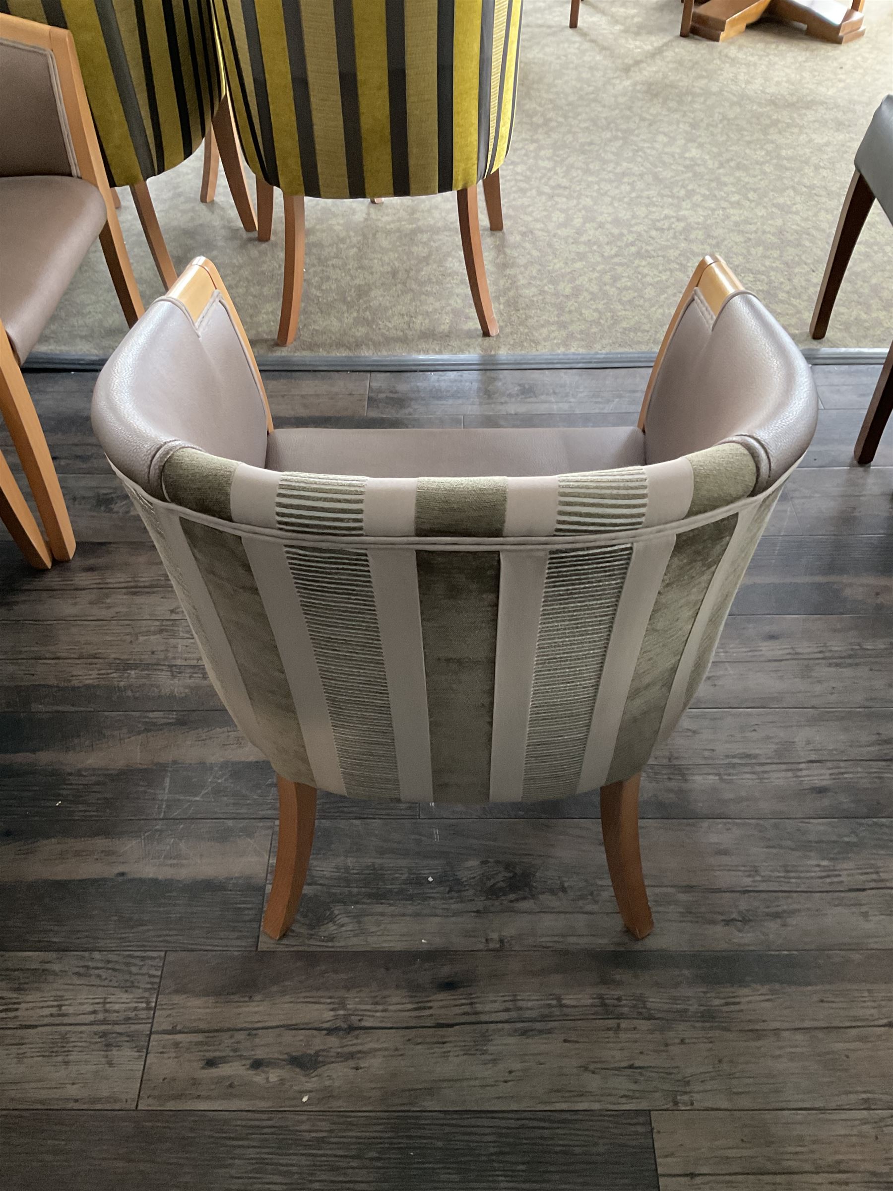 Seven tub shaped armchairs, beech framed, bronze and pattern cover- LOT SUBJECT TO VAT ON THE HAMMER PRICE - To be collected by appointment from The Ambassador Hotel, 36-38 Esplanade, Scarborough YO11 2AY. ALL GOODS MUST BE REMOVED BY WEDNESDAY 15TH JUNE.