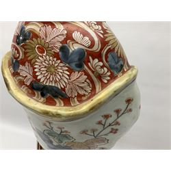 Large Japanese Imari porcelain figure, modelled as a Bijin, wearing a long kimono decorated with apple blossom and leafy branches on a white ground, with gilt detailing, possibly Edo period, H63cm