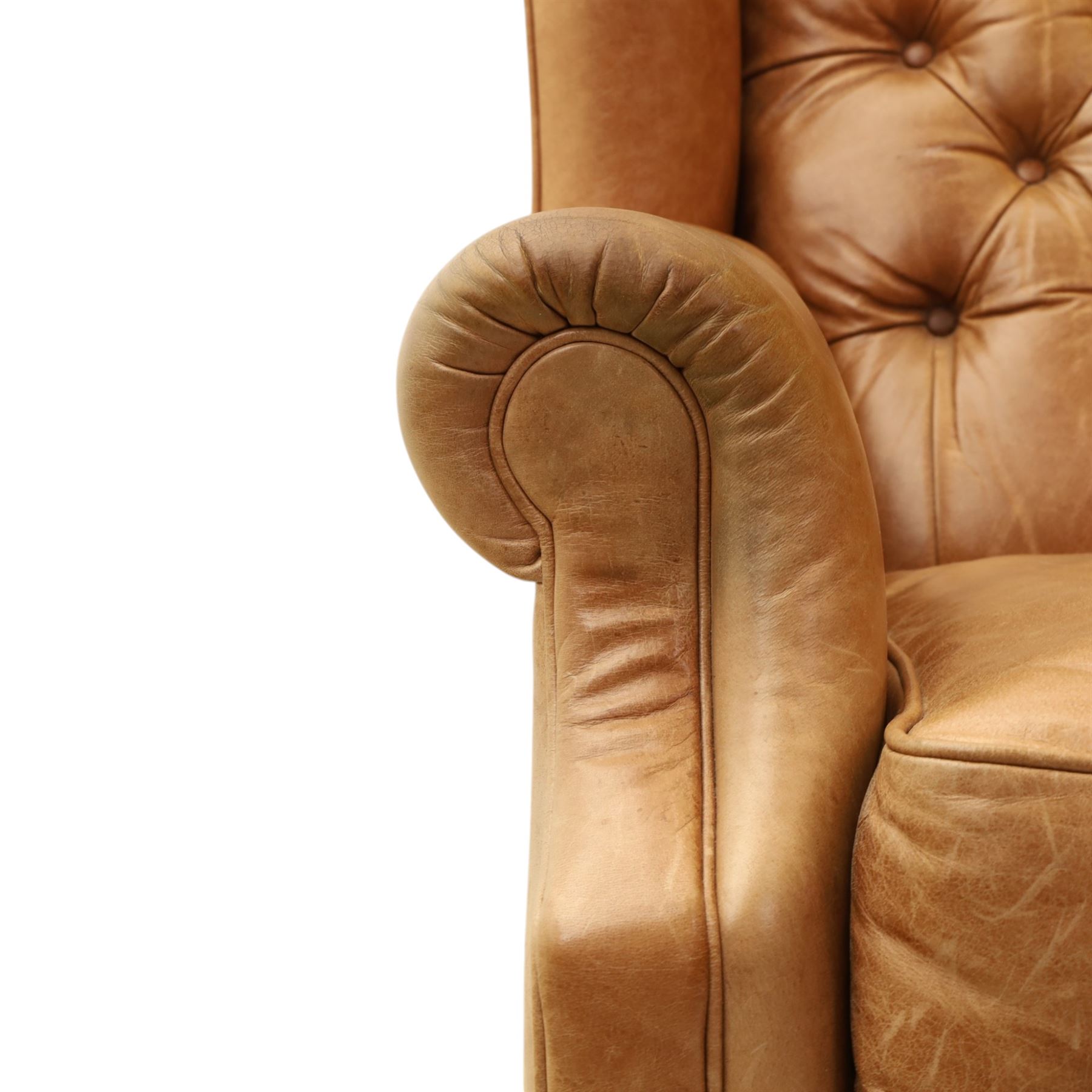 TETRAD for John Lewis - brown leather upholstered wingback armchair, button back with diamond tufted detail, loose seat cushion with piped edge, scroll arms and padded side wings, on short supports