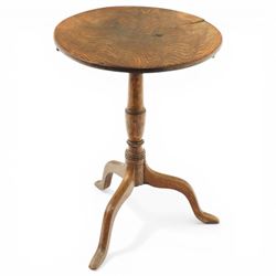 George III figured elm wine table with oval flip-top, raised on turned vasiform pedestal w...