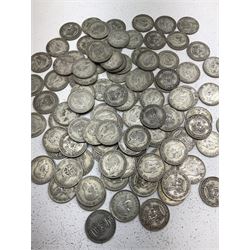 Approximately 560 grams of Great British pre 1947 silver one shilling coins