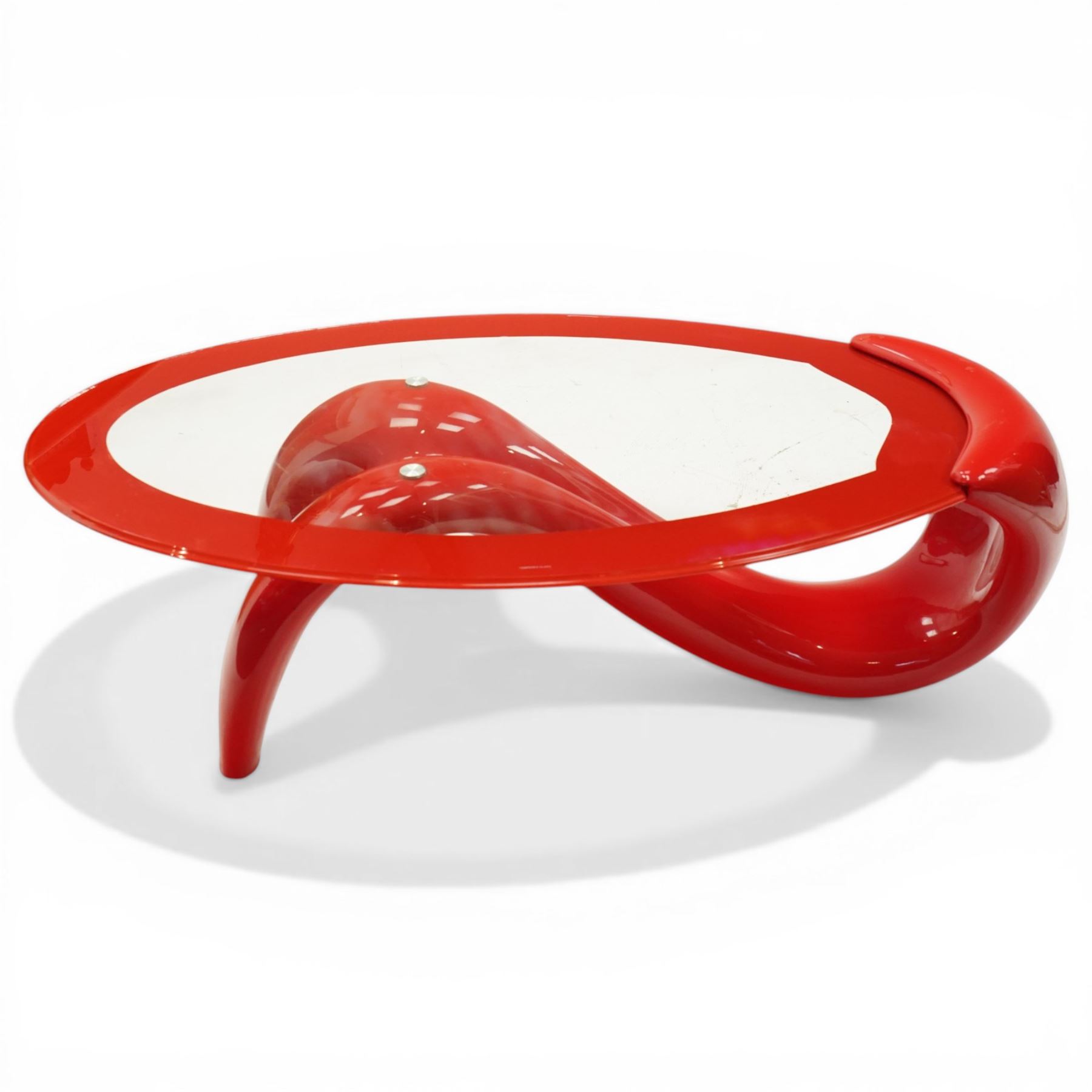 Italian post-modern design coffee table, oval glazed top with red banding over a shaped base of female form
