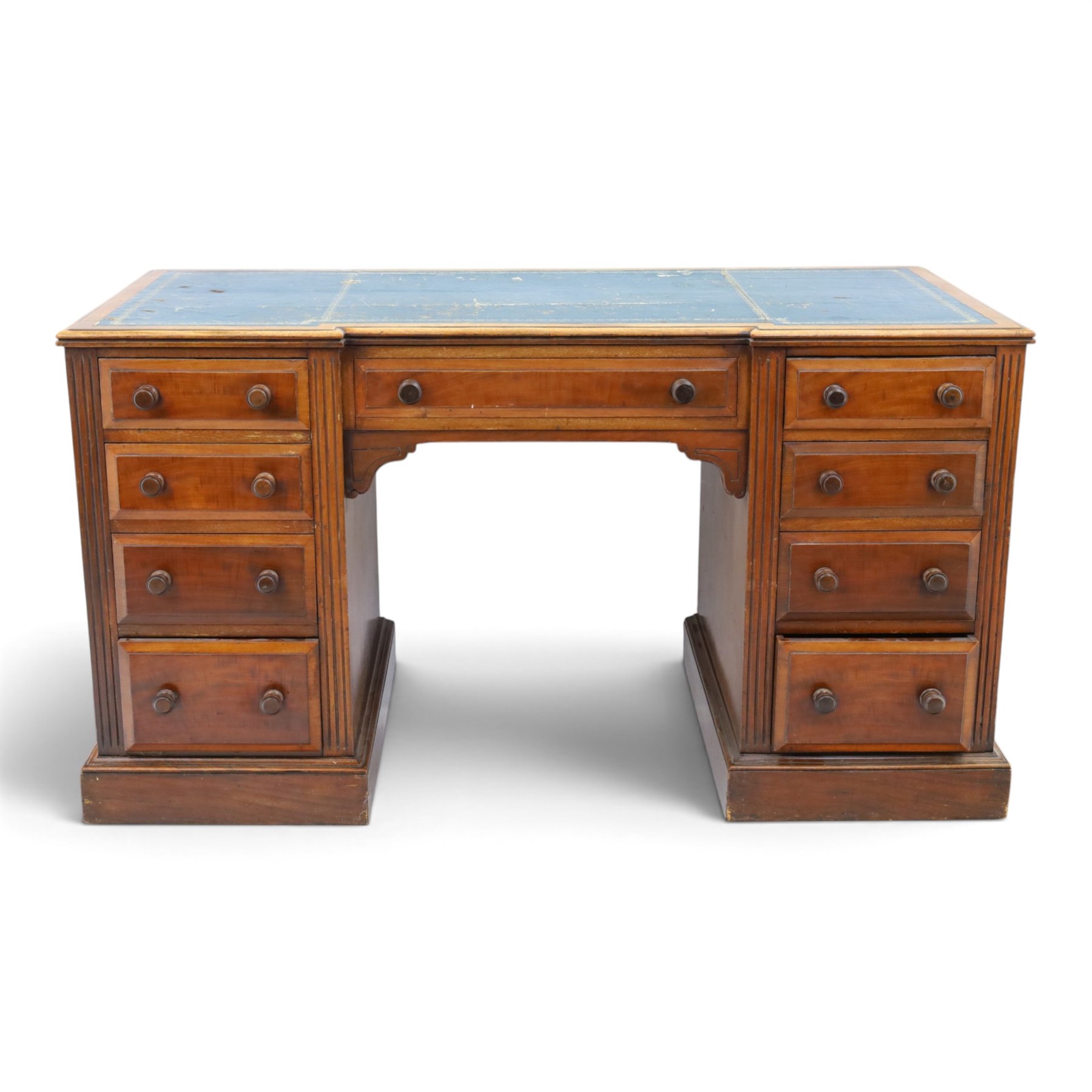 Victorian mahogany inverse breakfront twin pedestal desk, inset leather top over central drawer, flanked by pedestals with four graduating drawers, raised on a plinth base