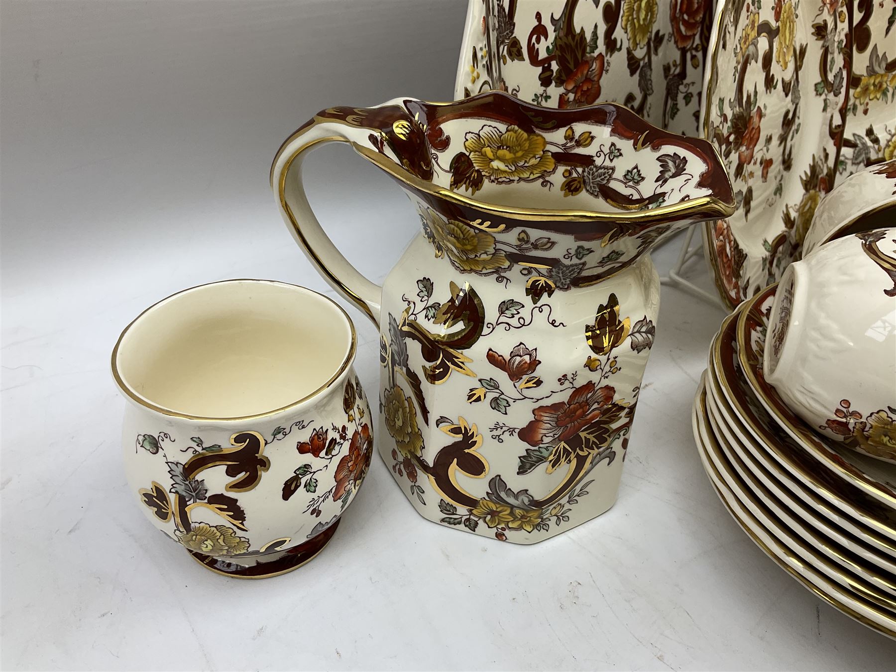 Masons Brown Velvet pattern tea and dinner wears, to include eight dinner plates, eight twin handled soup bowls and saucers, eight tea cups and saucers, cheese cover and plate, jug, meat platter etc (84)  