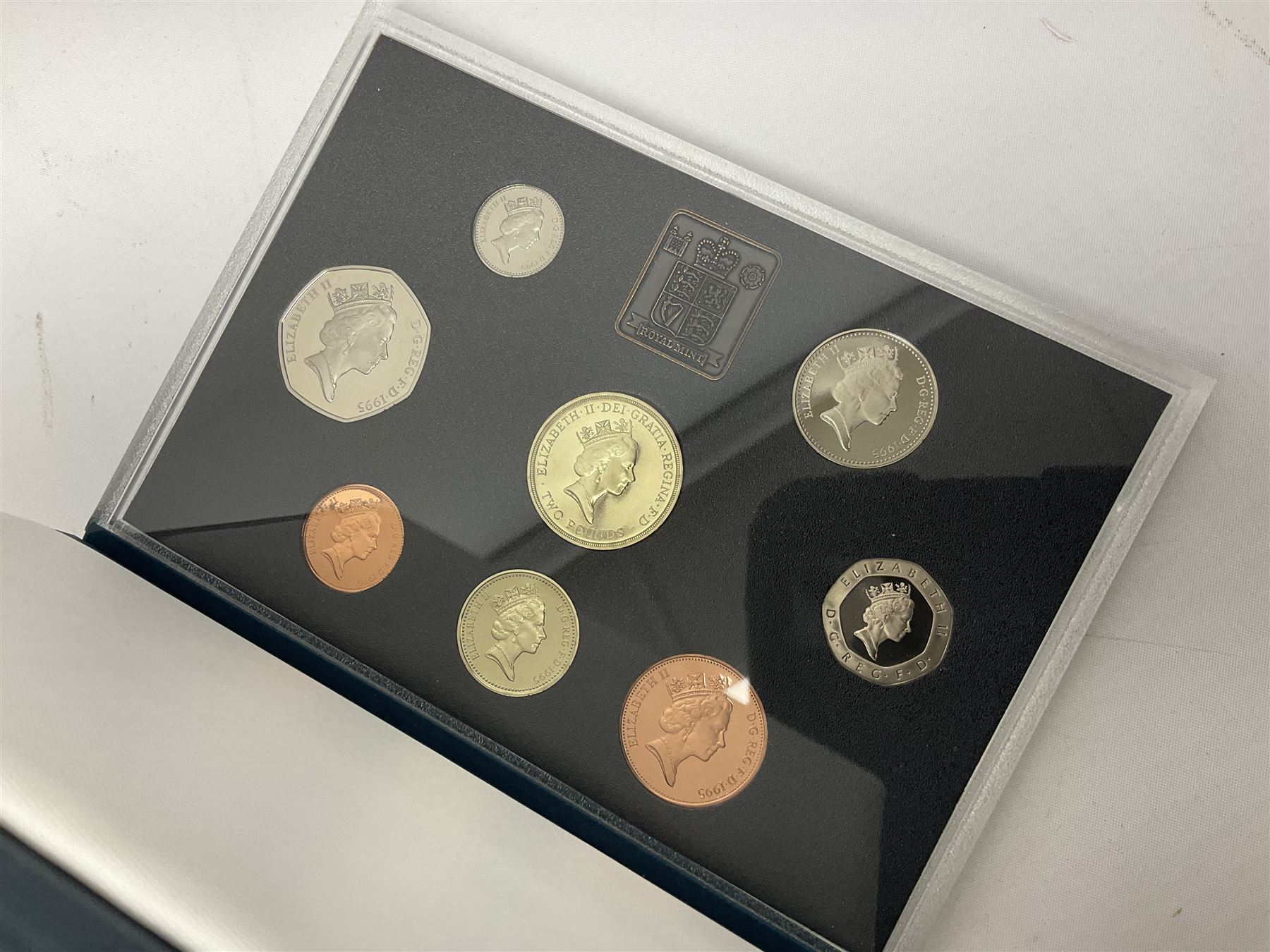 Six The Royal Mint United Kingdom proof coin collections, dated 1995, 1996, 1998, 2002, 2006 and 2007 all cased with certificates